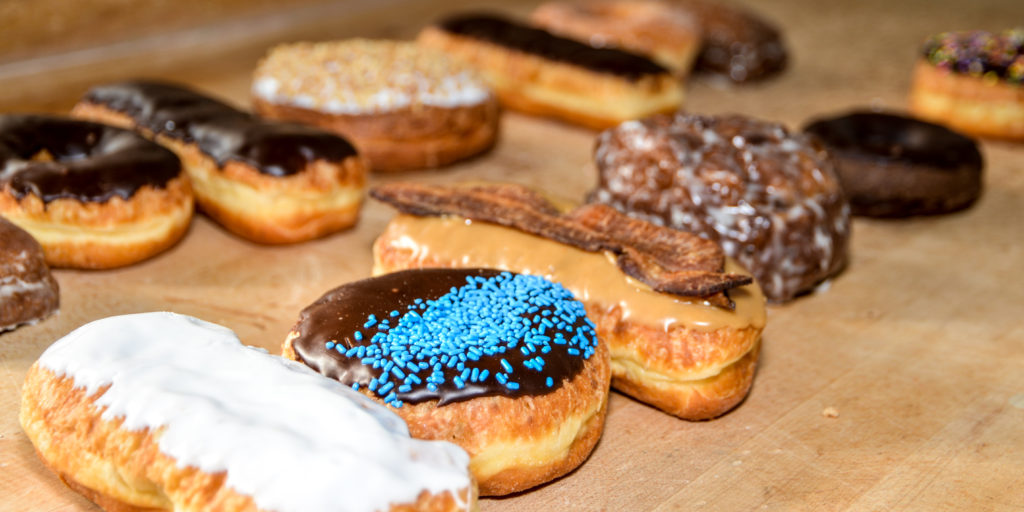 Doughnuts lines up on the work table